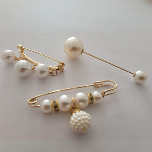 Broches de perlas blancas para  sujetar y decorar tu vestimenta